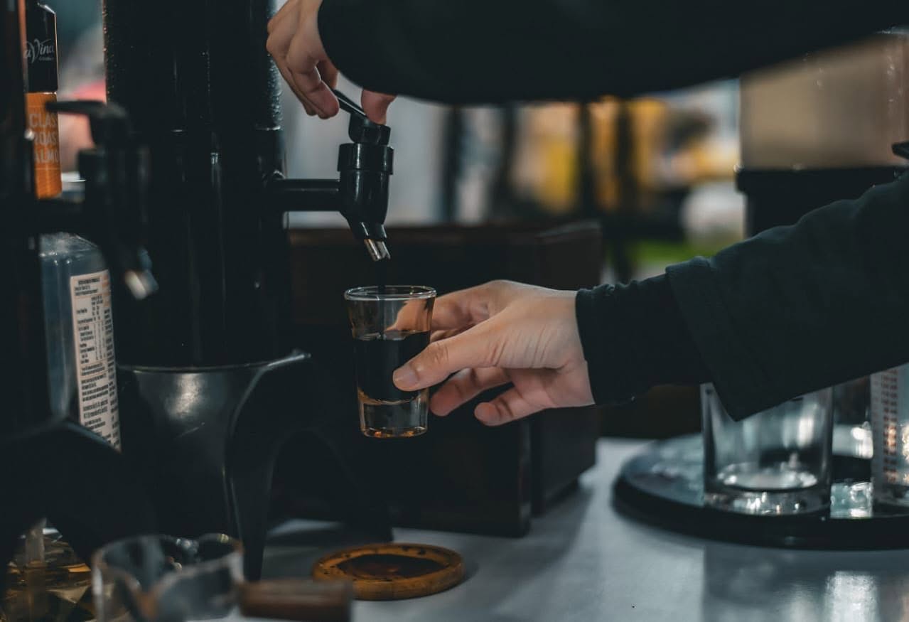 Fresh espresso pouring from the machine